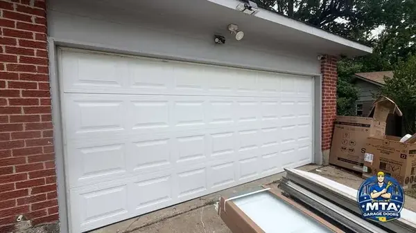 Interior view of a residential garage door and tracks photographed for MTA Garage Doors